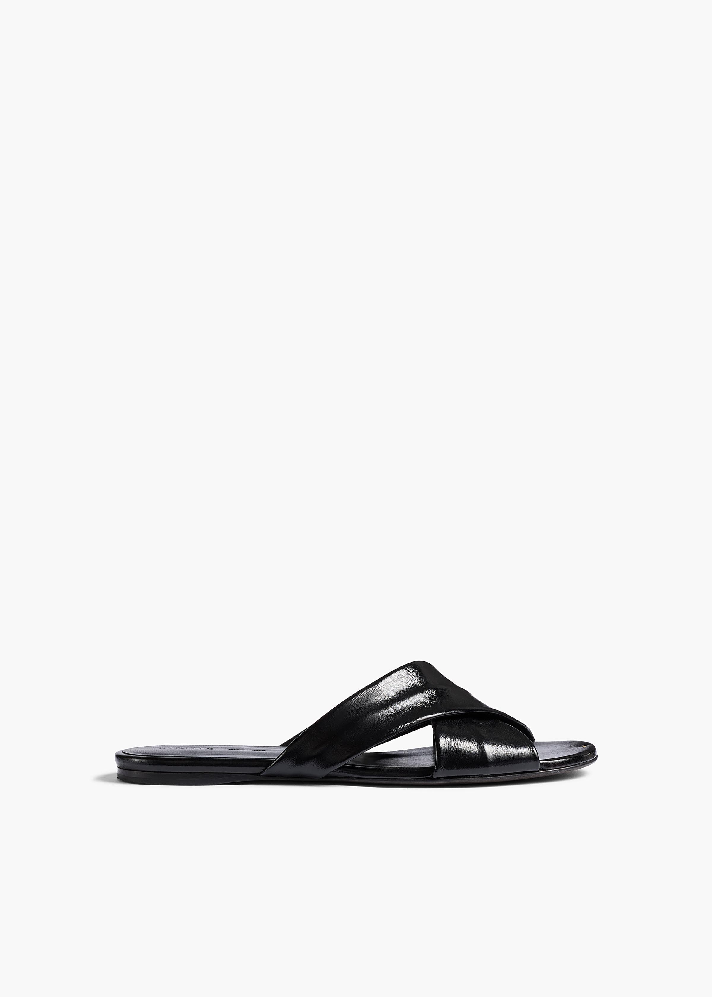 Liria Flat Sandal in Black Glazed Leather
